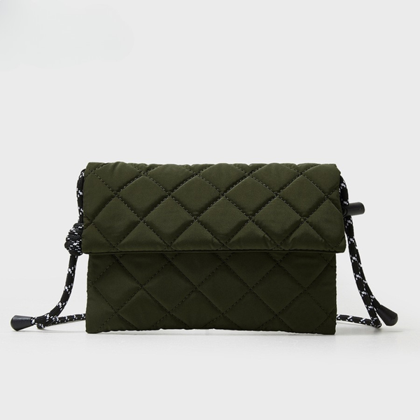 Aria Quilted Utility Crossbody in olive green front view with flap and cord strap