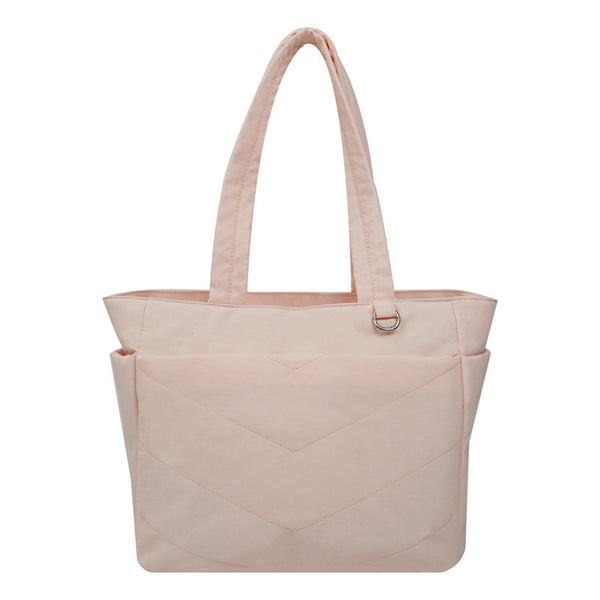 Aura Quilted Nylon Tote in pale pink front view with long shoulder handles