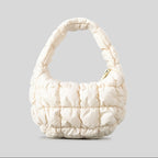 Beige Puffy Quilted Hobo bag front view showing soft padded texture and shoulder handle